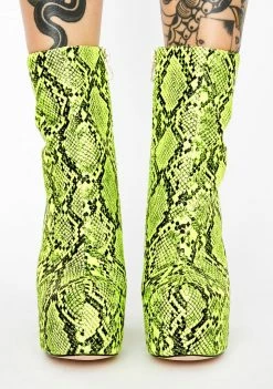 Lemon Drop By Privileged Platforms Act Up Snakeskin Platform Boots